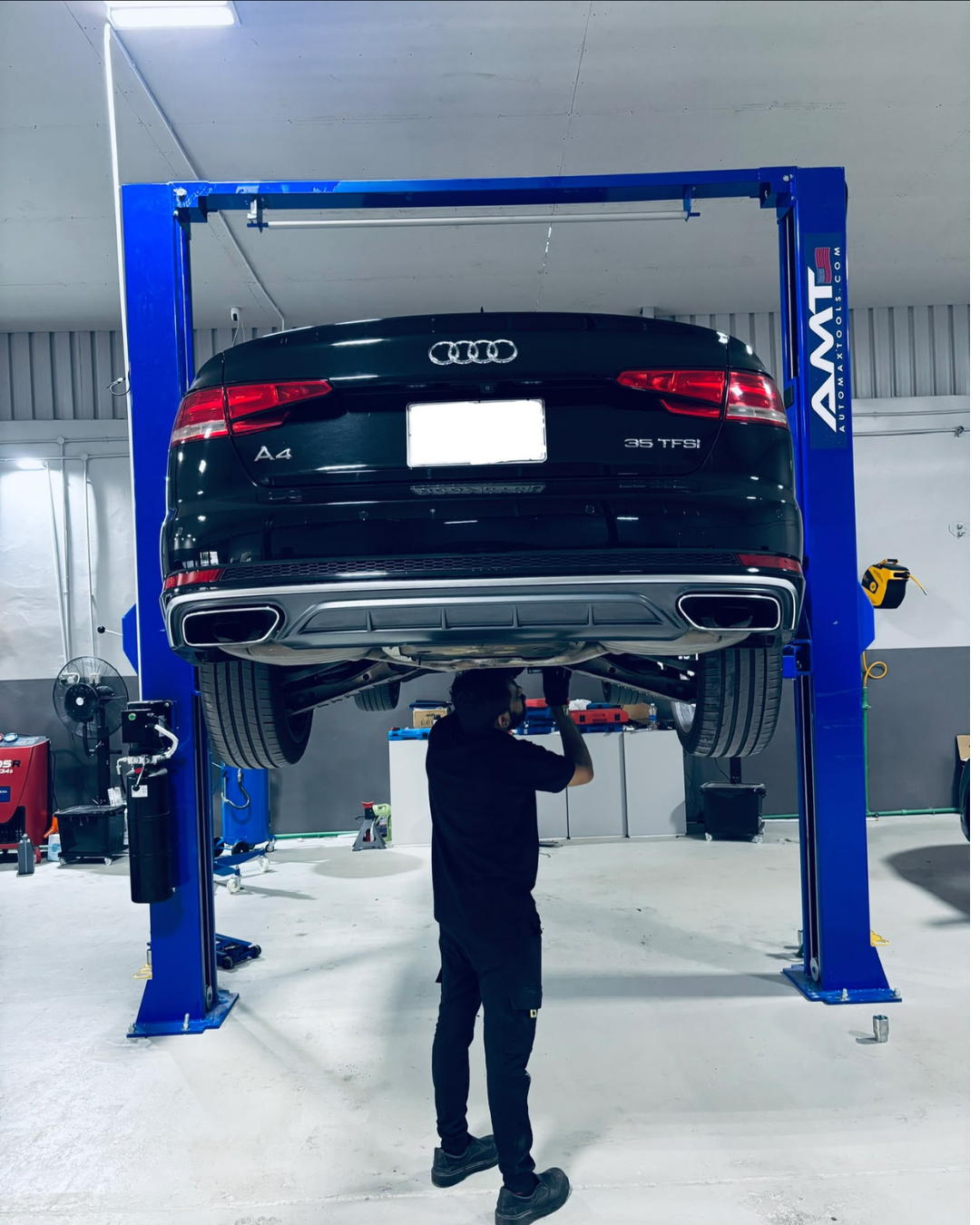 Audi on a lift for maintenance