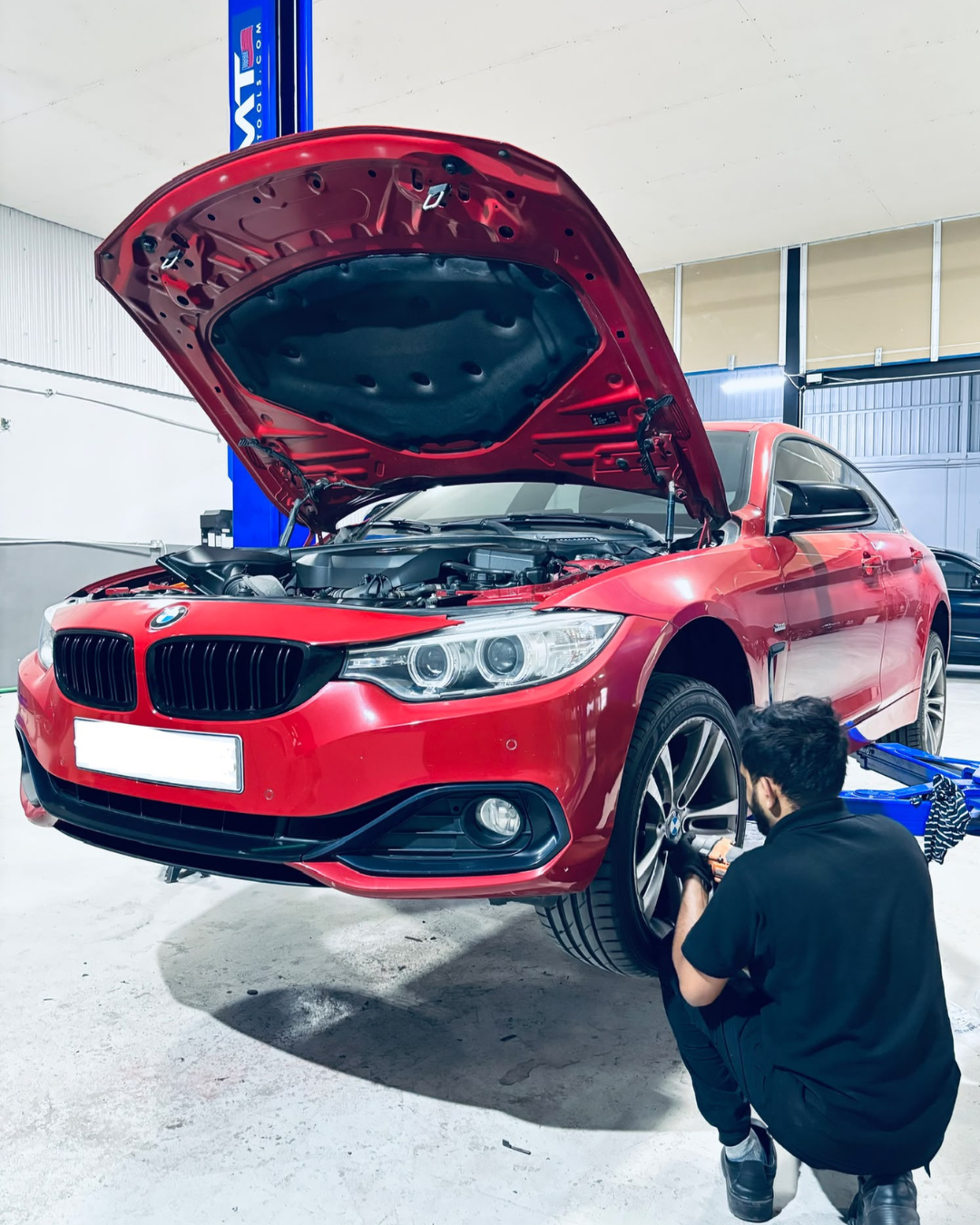 BMW receiving wheel service at MOTIX Garage